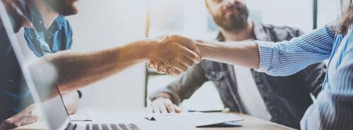 <span class="caption">Employees and their organisations can gain from union membership, research shows.</span> <span class="attribution"><a class="link " href="https://www.shutterstock.com/image-photo/business-partnership-handshake-concept-two-coworkers-720820906" rel="nofollow noopener" target="_blank" data-ylk="slk:SFIO CRACHO/Shutterstock;elm:context_link;itc:0;sec:content-canvas">SFIO CRACHO/Shutterstock</a></span>