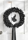 <p>You'll be bewitched by how easy these wreath is to make. All you need are a few supplies and your spooky creation comes to life (cue maniacal laughter).</p><p><strong>Make the Witch Wreath: </strong>Cut 150 6-inch-long strips of 2-inch-wide black grosgrain ribbon. Fold the strips in half and attach them to a 16-inch foam wreath form with straight pins, layering them on top of each other to create a ruffle effect. Cut out a silhouette of a witch from black kraft paper. Attach it to the center of a 16-inch round clear piece of acrylic with double-sided tape. Hot-glue the edges of the acrylic round to the back of the wreath form. Finish with a bow with long tails. </p>