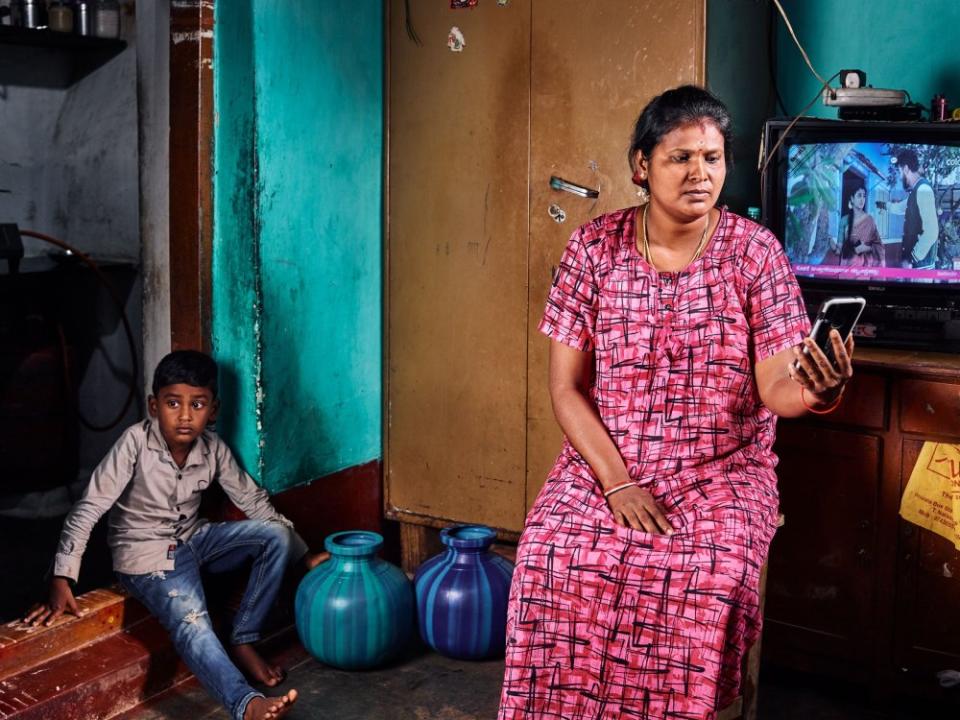 <strong>Rajeshwari N. left her job as a garment factory worker and now works for Karya, a nonprofit AI data company in southern India.</strong> "<a href="https://time.com/6297403/the-workers-behind-ai-rarely-see-its-rewards-this-indian-startup-wants-to-fix-that/" rel="nofollow noopener" target="_blank" data-ylk="slk:The Workers Behind AI Rarely See Its Rewards. This Indian Startup Wants to Fix That,;elm:context_link;itc:0;sec:content-canvas" class="link ">The Workers Behind AI Rarely See Its Rewards. This Indian Startup Wants to Fix That,</a>" August 14 issue.<span class="copyright">Supranav Dash for TIME</span>