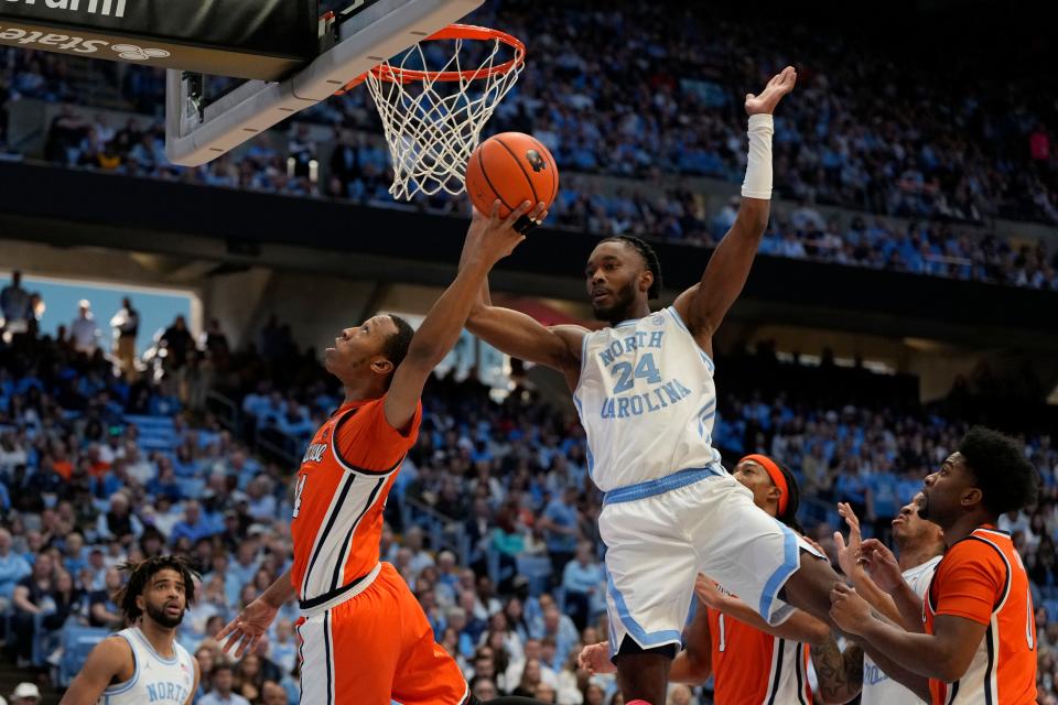 Syracuse guard Quadir Copeland shoots as North Carolina forward Jae'Lyn Withers defends earlier this season. Withers has delivered on defense for the Tar Heels.