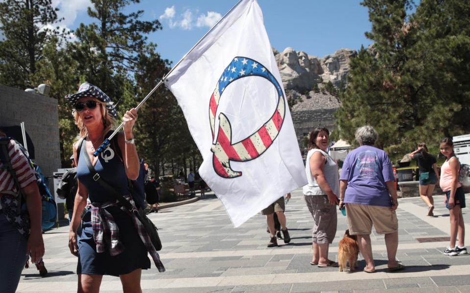 A QAnon and Trump supporter in South Dakota, 2020 - Getty