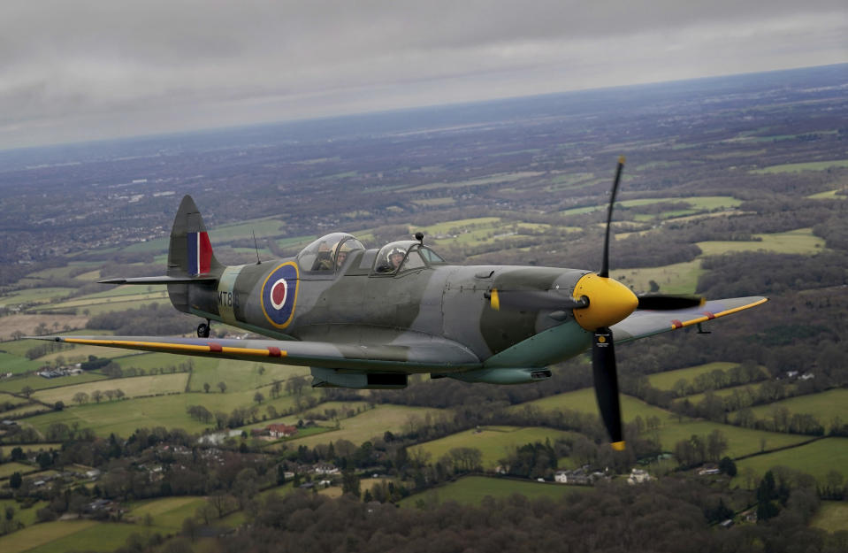 102-year-old Jack Hemmings AFC flies a Spitfire plane to mark 80th anniversary of the military charity Mission Aviation Fellowship (MAF) after taking off at the iconic Heritage Hanger at London Biggin Hill, England, Monday, Feb. 5, 2024. Hemmings, who lives at home in Horam, Sussex, took to the skies in Britain's best-loved Second World War aircraft to raise money for MAF, the charity he co-founded almost 80 years ago. (Gareth Fuller/PA via AP)