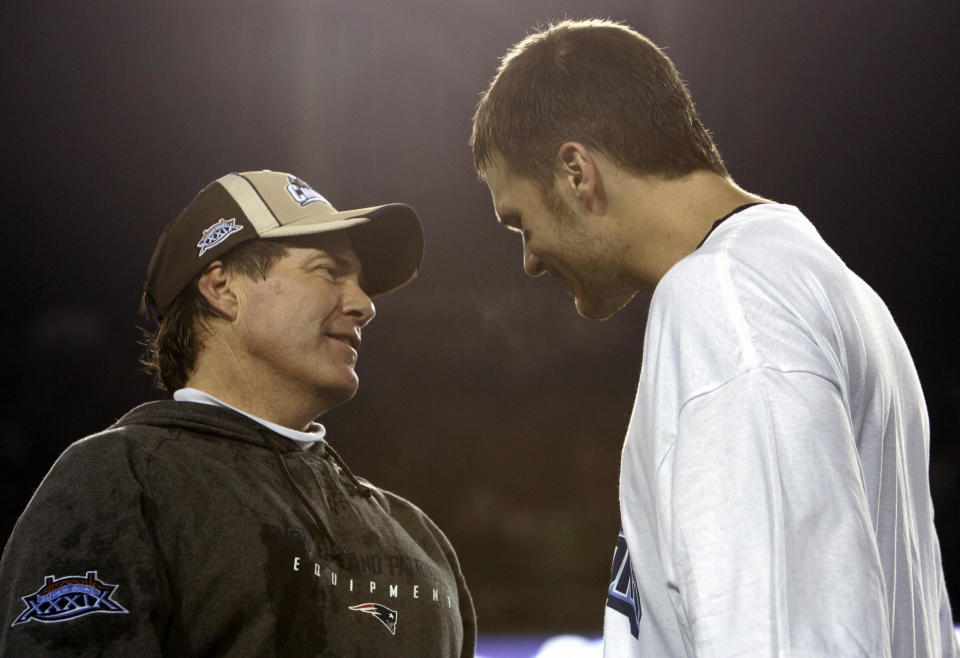 Bill Belichick and Tom Brady change the image for the New England Patriots forever. (Photo credit should read JEFF HAYNES/AFP via Getty Images)