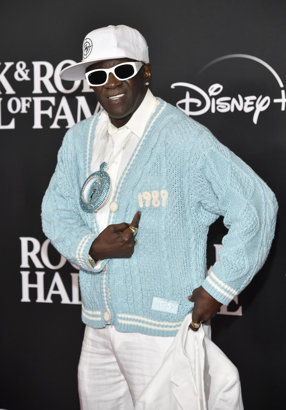 Flavor Flav arrives at the Rock & Roll Hall of Fame Induction Ceremony on Friday, Nov. 3, 2023, at Barclays Center in New York. (Photo by Evan Agostini/Invision/AP)