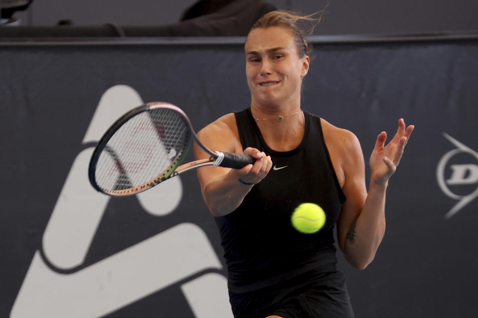 Belarus' Aryna Sabalenka makes a forehand return to Czech Republic's Linda Noskova during the final of the Adelaide International Tennis tournament in Adelaide, Australia, Sunday, Jan. 8, 2023. (AP Photo/Kelly Barnes)