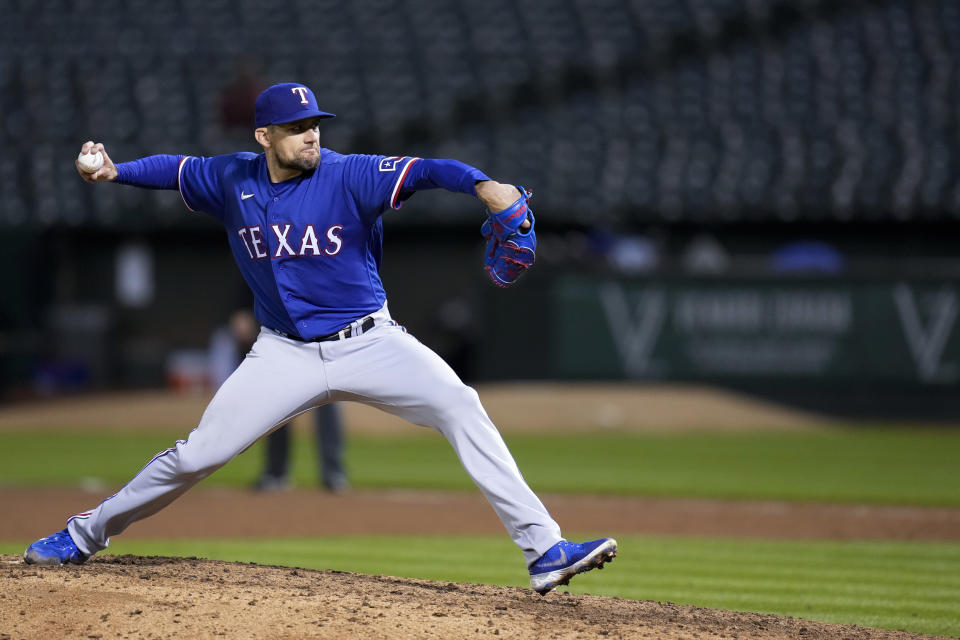 Texas Rangers' Nathan Eovaldi pitches against the Oakland Athletics during the seventh inning of a baseball game in Oakland, Calif., Thursday, May 11, 2023. (AP Photo/Godofredo A. Vásquez)