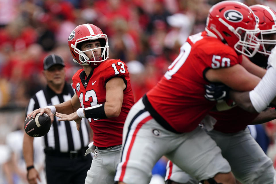 Stetson Bennett and Georgia are the new No. 1 team in the AP Top 25. (AP Photo/John Bazemore)