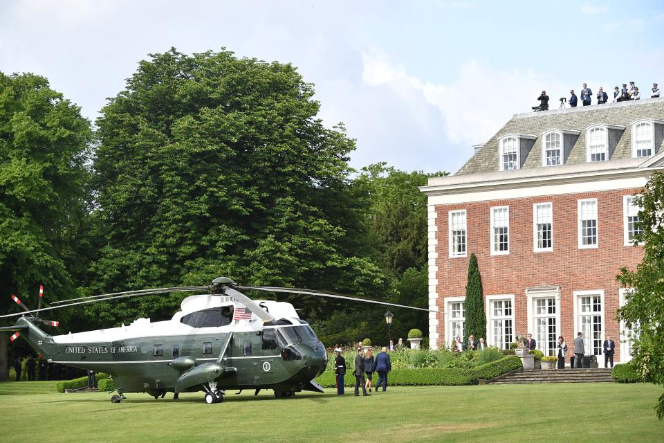 US President Donald Trump (CR) and US First Lady Melania Trump (CL) disembark Marine One at Winfield House, the  residence of the US Ambassador, in London on June 3, 2019, as they arrive to begin a three-day State Visit to the UK. - Britain rolled out the red carpet for US President Donald Trump on June 3 as he arrived in Britain for a state visit already overshadowed by his outspoken remarks on Brexit. (Photo by MANDEL NGAN / AFP)        (Photo credit should read MANDEL NGAN/AFP/Getty Images)