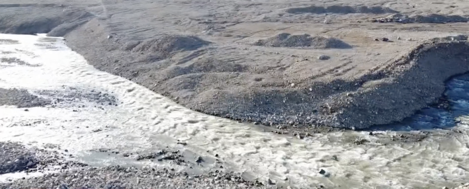 Water rushes over Greenland as the icy island experiences a heatwave (CNN)