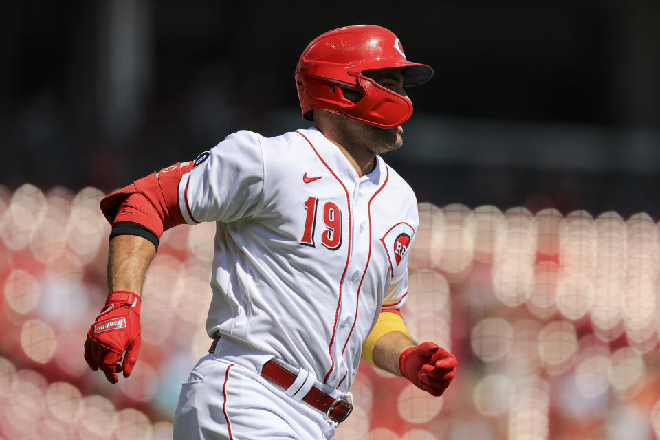 Cincinnati Reds' Joey Votto runs the bases after hitting a two-run home run during the first inning of a baseball game against the Pittsburgh Pirates in Cincinnati, Monday, Sept. 27, 2021. (AP Photo/Aaron Doster)