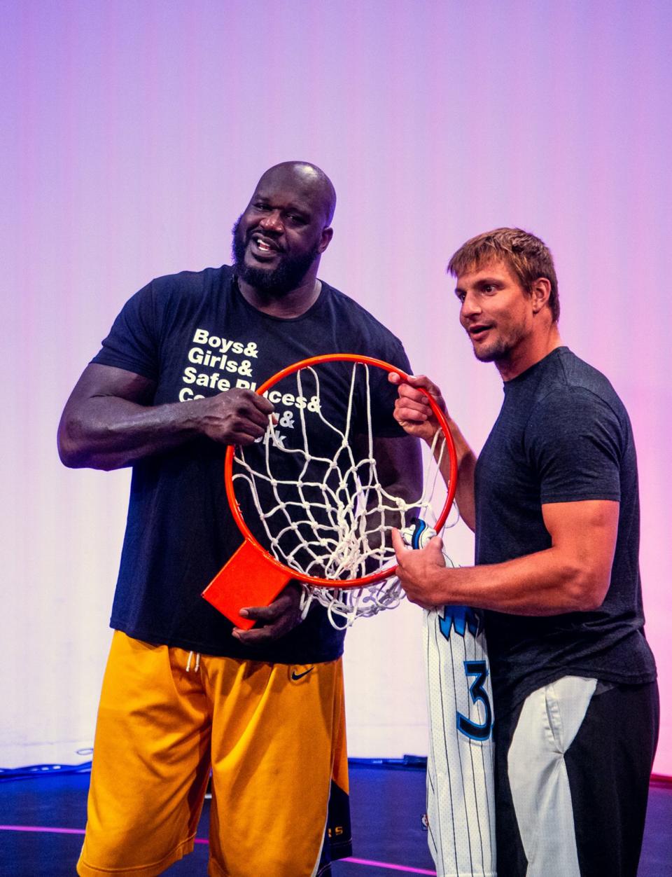 <p>Shaq breaks his hoop during a digital game of HORSE against Rob Gronkowski powered by fans on his website using the Yappa commenting tool on Saturday.</p>
