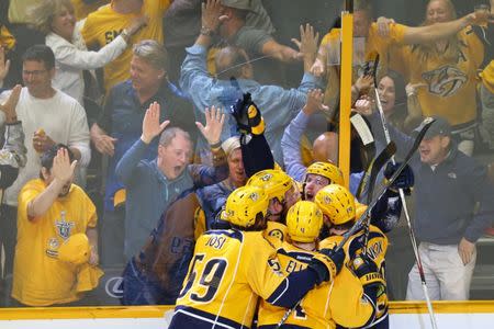 May 22, 2017; Nashville, TN, USA; Nashville Predators center Colton Sissons (back right) reacts with teammates after scoring his hat-trick goal on a shot against the Anaheim Ducks in the third period in game six of the Western Conference Final of the 2017 Stanley Cup Playoffs at Bridgestone Arena. Mandatory Credit: Aaron Doster-USA TODAY Sports