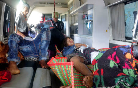 Rakhine State residents arrive at the hospital in Sittwe, Myanmar, after getting injured by the police in a demonstration the night before, January 17, 2018. REUTERS/Stringer