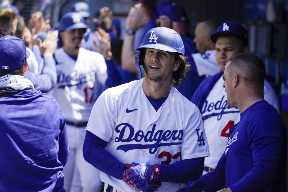 Dodgers' James Outman celebrates after his grand slam in the seventh inning Wednesday against the Minnesota Twins.