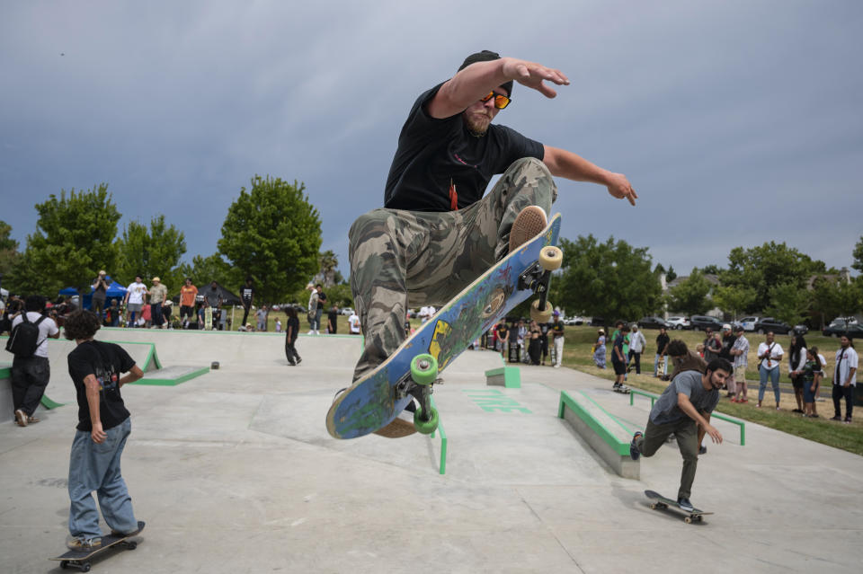 Devin Bales skates after the ribbon-cutting ceremony on Sunday, June 11, 2023, for the Tyre Nichols Skate Park, named in honor of the former Sacramento resident who was fatally beaten by Memphis police officers following a traffic stop in January, at Regency Community Park in Sacramento's North Natomas neighborhood. Bales was on the team that helped renovate the park. (Sara Nevis/The Sacramento Bee via AP)