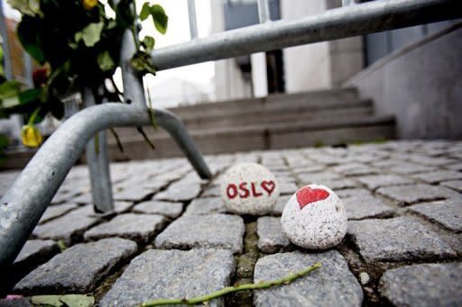 Flowers and decorated stones are pictured outside the courthouse during Ander Behring Breivik's trial in Oslo. Breivik -- the gunman who killed 77 people in Norway's massacres -- showed no emotion as he recalled shooting his victims at point-blank range, but insisted he was a nice person and not a psychiatric case