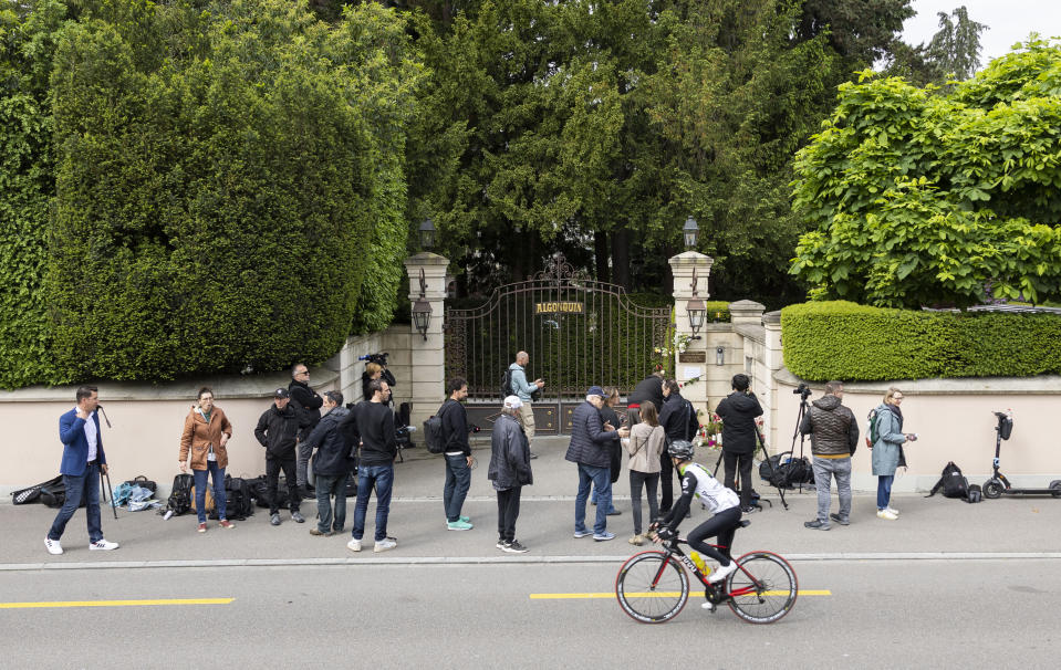 Media gather at the gate of the house of late singer and stage performer Tina Turner in Kuesnacht, Switzerland, on Thursday, May 25, 2023. Turner, the unstoppable singer and stage performer, died Wednesday, after a long illness at her home in Kuesnacht near Zurich, Switzerland, according to her manager. She was 83. (AP Photo/Arnd Wiegmann)