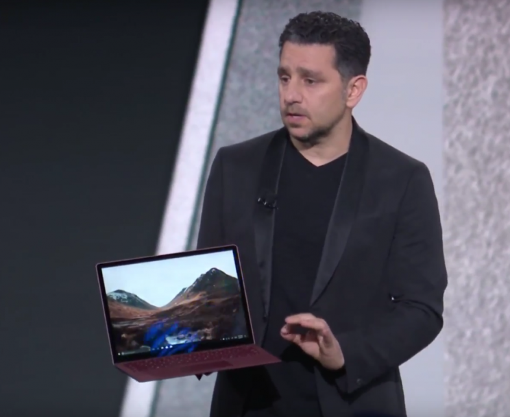 Microsoft’s Panos Panay holds a Surface Laptop at the company’s event on Tuesday.