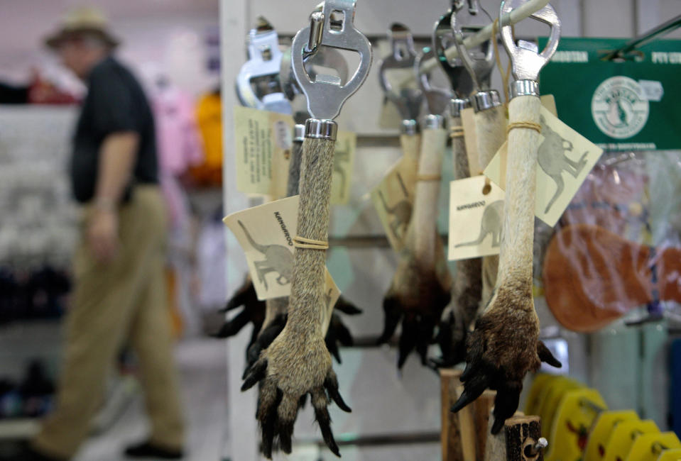 Kangaroo paw souvenir items, like these one pictured hanging off a rack inside a shop, continue to be sold in Australia.