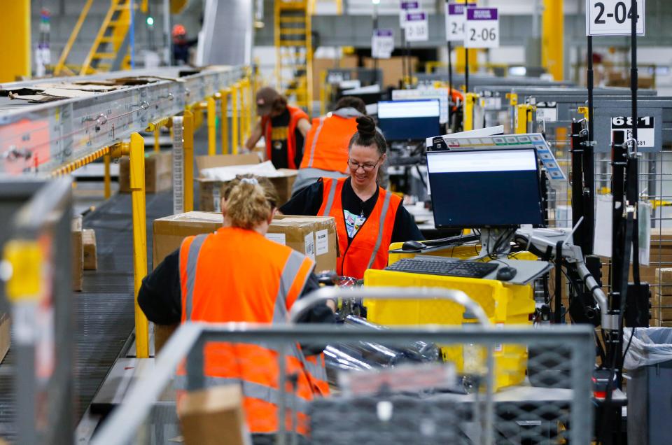 The STL3 Amazon fulfillment center in Republic was bustling with activity on Friday, Dec. 2, 2022 as the holiday shopping season is underway.