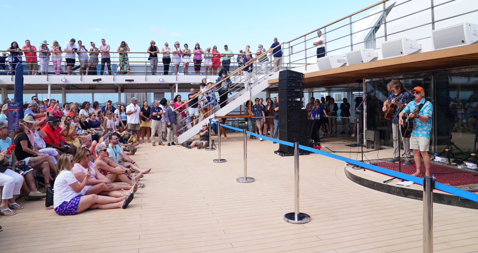 Jimmy Buffett surprised the guests aboard the maiden voyage of Margaritaville at Sea with an impromptu concert.