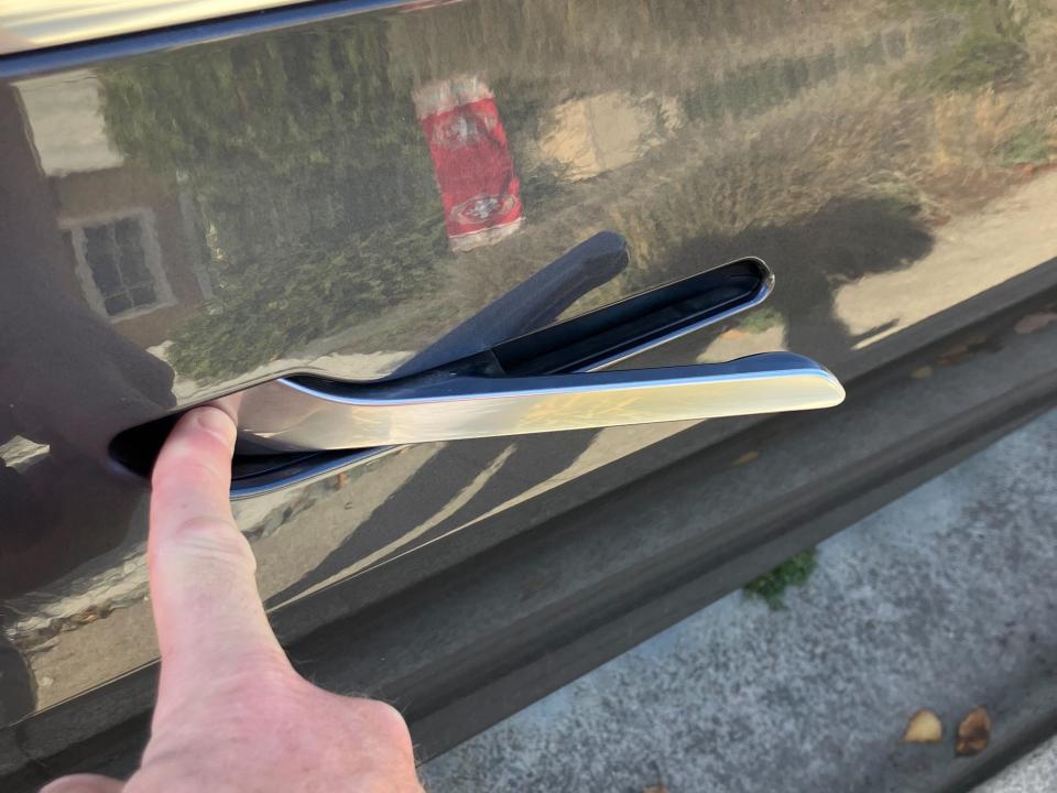 Close up of a Tesla Model 3 door handle