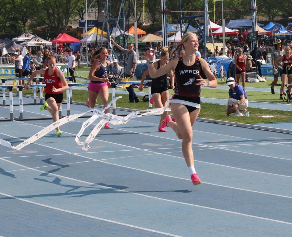 Weber’s Eden Devries crosses the finish line on her record-setting 100 hurdles run of 14.04 at the 6A state championships at BYU on Saturday, May 20. | Provided by Jeff Richards, St. George News