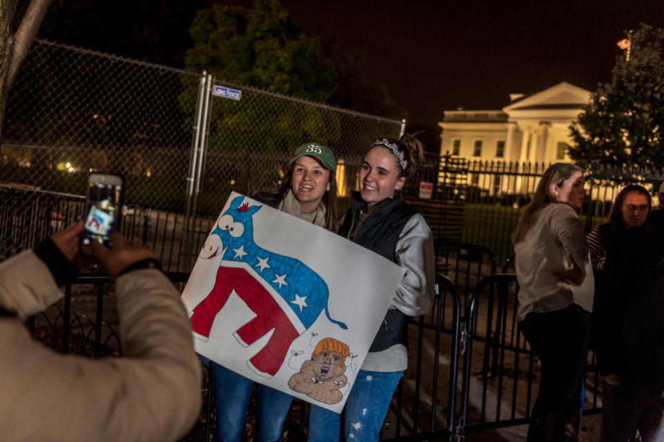 Tears and cheers as Donald Trump and Hillary Clinton supporters clash at the White House