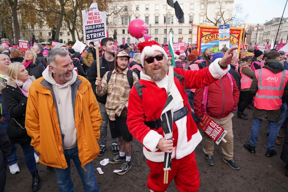 Striking Santa rallies at Royal Mail strike in Parliament Square (Jonathan Brady/PA Wire)