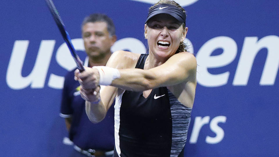 Maria Sharapova competes against Carla Suarez Navarro during US Open. (Photo by Mohammed Elshamy/Anadolu Agency/Getty Images)