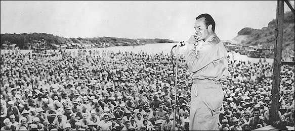 Comedian Bob Hope performs before thosands of soldiers in South Korea during a USO Christmas tour in 1951. A proposed Florida specialty license plate would benefit the USO.