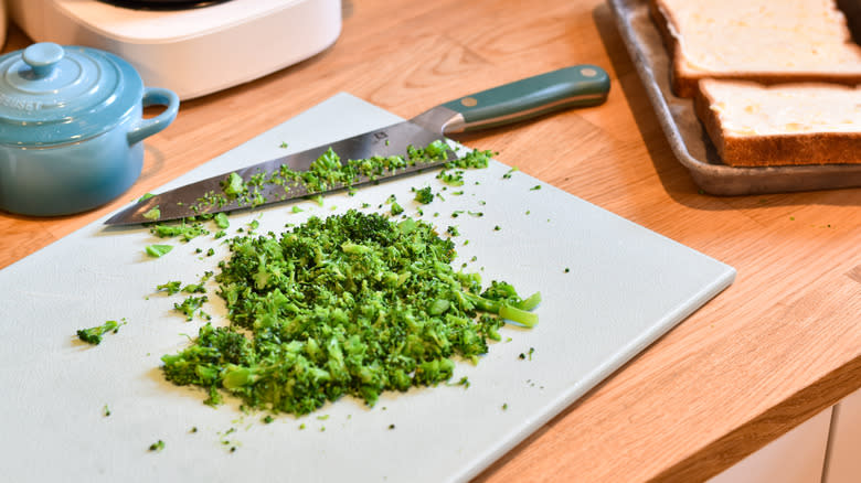 chopping broccoli florets