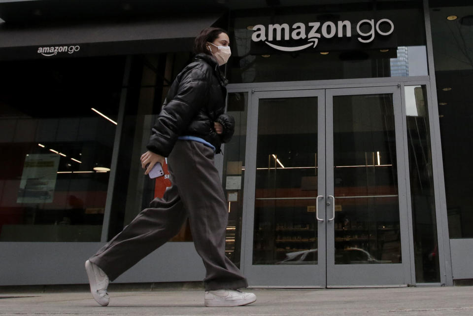 A woman walks past an Amazon Go store on March 6, 2023, in New York City.  / Credit: Leonardo Munoz/VIEWpress via Getty Images