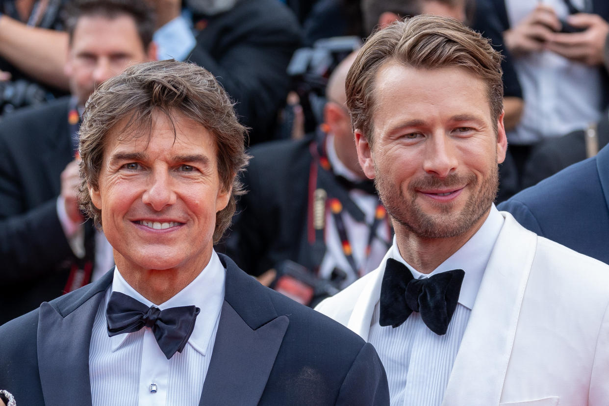 CANNES, FRANCE - MAY 18: Tom Cruise and Glen Powell attend the screening of 