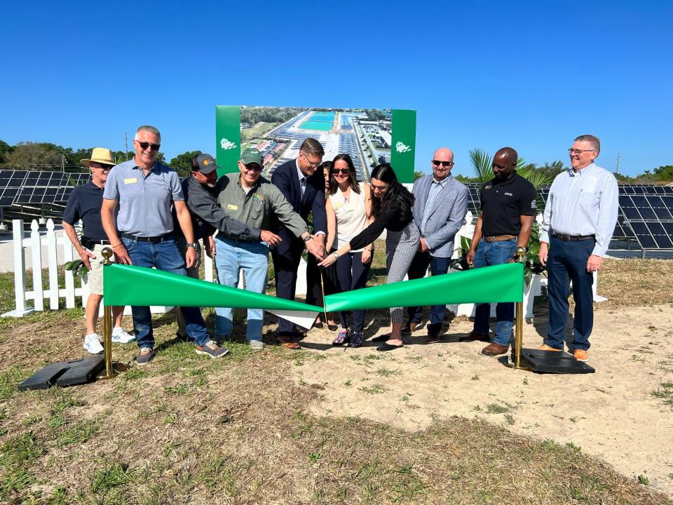 City officials and Novasol Energy at a March 2023 ribbon cutting of the Mount Dora Community Solar Farm.