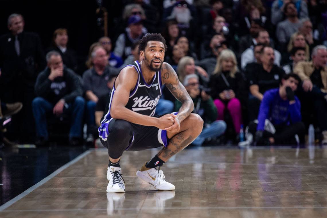 Sacramento Kings guard Malik Monk (0) sits on the court as the game was out of hand during an NBA game against the Detroit Pistons on Wednesday, Feb. 7, 2024 at Golden 1 Center. 