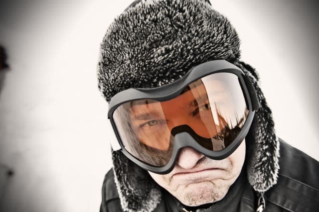 Portrait of a man in ski goggles.