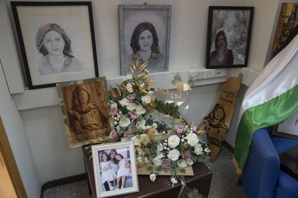 A corner is dedicated for late Al Jazeera network journalist Shireen Abu Akleh inside the network's office, in the West Bank city of Ramallah Sunday, May 5, 2024. Israel ordered the local offices of Qatar's Al Jazeera satellite news network to close Sunday, escalating a long-running feud between the broadcaster and Prime Minister Benjamin Netanyahu's hard-line government as Doha-mediated cease-fire negotiations with Hamas hang in the balance. (AP Photo/Nasser Nasser)