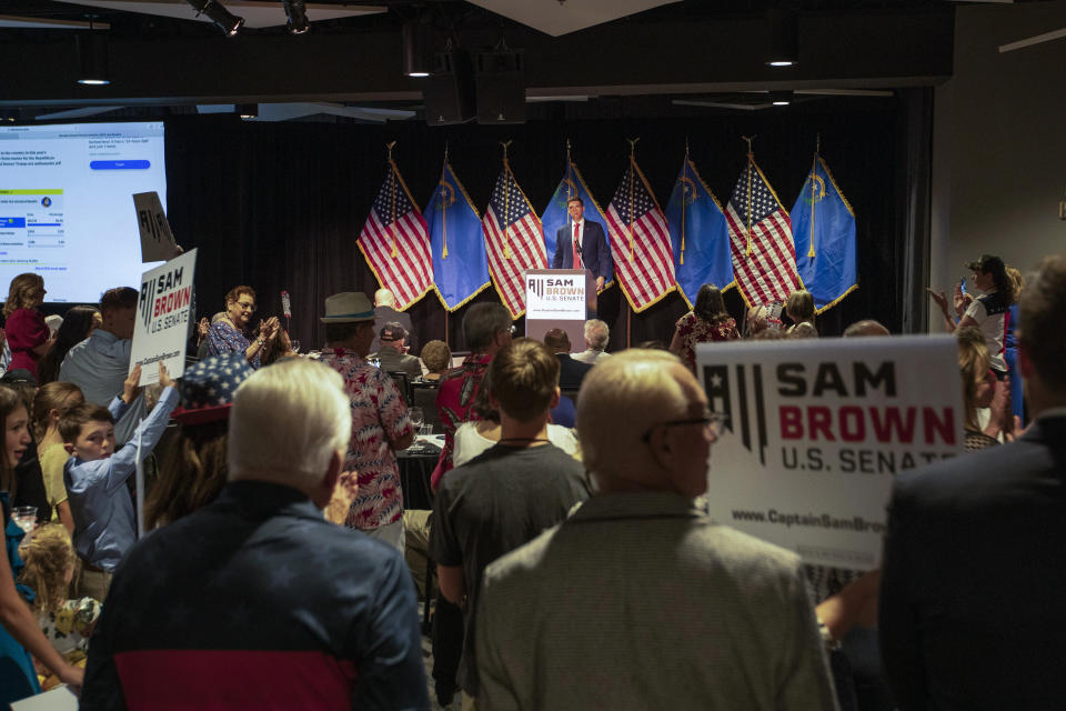 Republican senatorial candidate Sam Brown speaks at an election night party Tuesday, June 11, 2024, in Reno, Nev. (AP Photo/Tom R. Smedes)