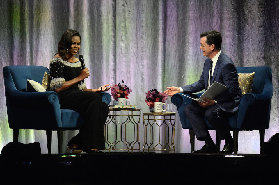 Mrs Obama was interviewed by Stephen Colbert in front of an audience in London’s O2 Arena (Picture: PA)