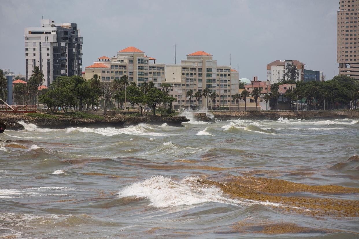 Strong waves and sargassum brought by the tide are seen at the Malecon after the passage of storm Elsa in Santo Domingo, on 4 July 4 2021. (afp/AFP via Getty Images)