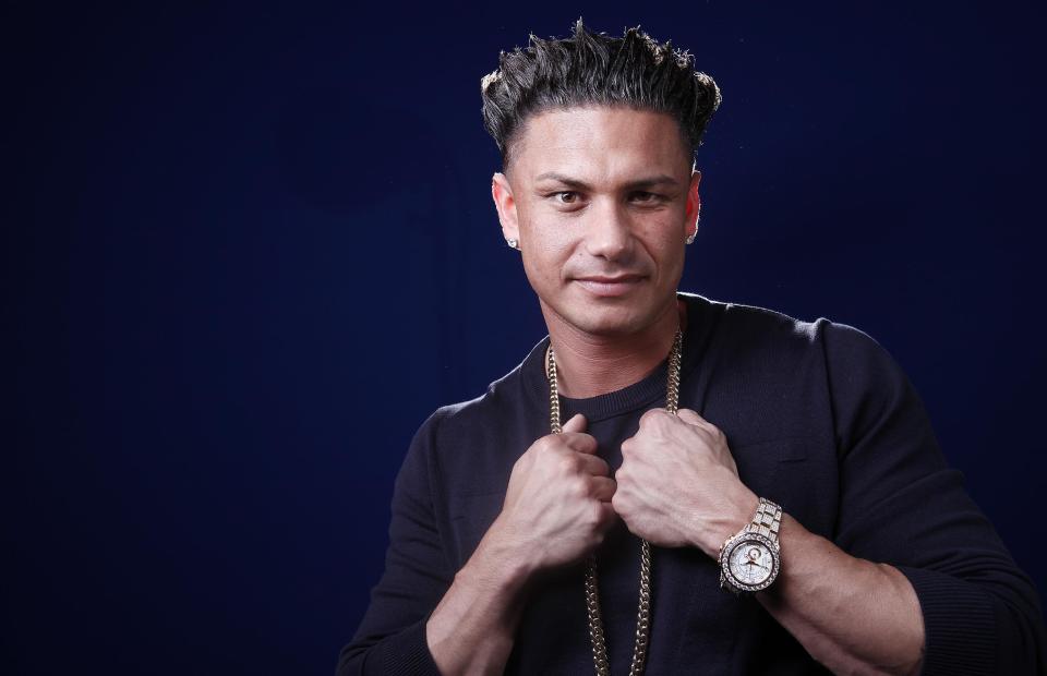 In this March 27, 2012 photo, TV personality Paul "Pauly D" DelVecchio poses for a portrait in New York. DelVecchio will have his own spin-off of "Jersey Shore" called "The Pauly D Project," premiering March 29 on MTV. (AP Photo/Carlo Allegri)