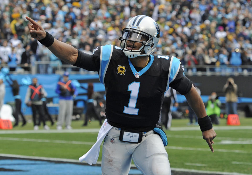 Former Carolina Panthers quarterback Cam Newton (1) remains unsigned. (AP Photo/Mike McCarn)