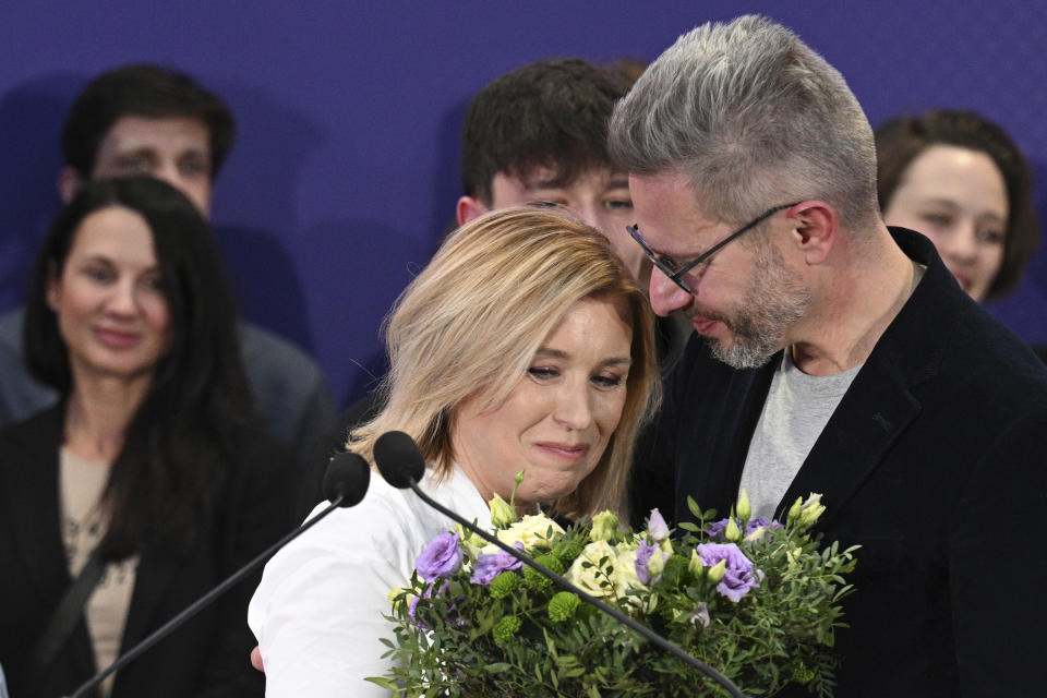 Czech Presidential candidate Danuse Nerudova and her husband Robert Neruda attend a press conference after announcement of the preliminary results for the first round of presidential election in Prague, Czech Republic, Saturday, Jan. 14, 2023. (Michal Kamaryt/CTK via AP)