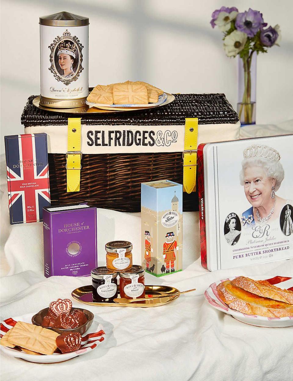 <p><strong>SELFRIDGES SELECTION</strong></p><p>selfridges.com</p><p><strong>£80.00</strong></p><p><a href="https://go.redirectingat.com?id=74968X1596630&url=https%3A%2F%2Fwww.selfridges.com%2FGB%2Fen%2Fcat%2Fselfridges-selection-the-jubilee-hamper_R03938625&sref=https%3A%2F%2Fwww.townandcountrymag.com%2Fsociety%2Ftradition%2Fg39825639%2Fplatinum-jubilee-souvenirs-gifts%2F" rel="nofollow noopener" target="_blank" data-ylk="slk:Shop Now;elm:context_link;itc:0;sec:content-canvas" class="link ">Shop Now</a></p><p>Give yourself a proper set up for watching all of the jubilee celebrations with this kit including a wicker basket, jubilee shortbread and tea tins, salted caramel milk chocolate crowns, a milk chocolate bar, and fruit preserves.</p>