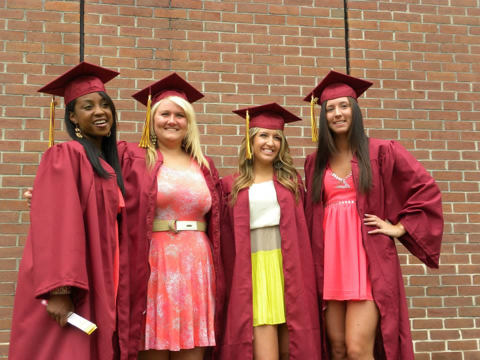 Four college graduates, Marissa Fattore on the right.
