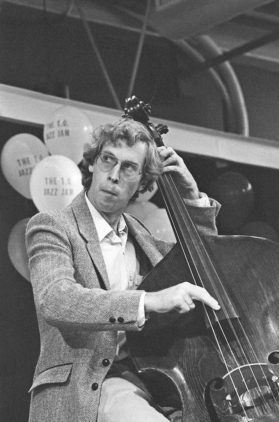 In this 1985 photo, provided by Mark Miller is Canadian bassist Neil Swainson during a performance in Toronto. A forgotten studio recording of the late jazz trumpeter Woody Shaw was released Sept. 11, 2020 on digital, as part of the latest effort to preserve jazz history. Vancouver, Canada-based Cellar Music Group’s imprint Reel to Real and New York distributor la reserve records this month made available “49th Parallel” - a 1987 recording led by Canadian bassist Swainson that features Shaw and tenor saxophonist Joe Henderson. (Mark Miller via AP)