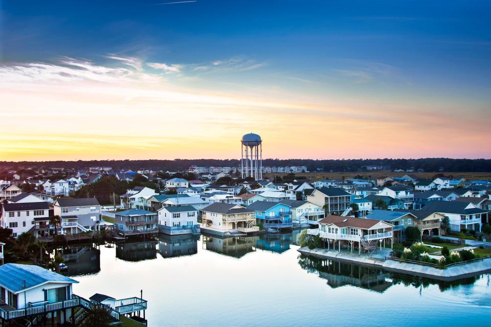 Houses sit along a saltwater inlet in North Myrtle Beach, South Carolina.