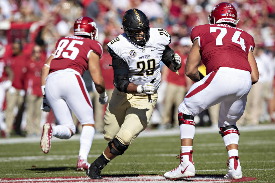 FAYETTEVILLE, AR – OCTOBER 27: Louis Vecchio #29 of the Vanderbilt Commodores rushes the quarterback and is blocked by Colton Jackson #74 of the Arkansas Razorbacks in the first half at Razorback Stadium on October 27, 2018 in Fayetteville, Arkansas. The Commodores defeated the Razorbacks 45-31. (Photo by Wesley Hitt/Getty Images)