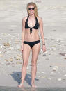 <p>Another trip to Cabo, another black bikini! Two months before her vacation with her ex, she was in Cabo San Lucas showing off her long legs by the shore. (Photo: FameFlynet) </p>